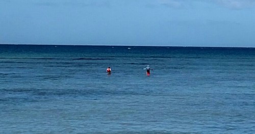 I witnessed the man on the right lose a BIG ONE.  The lady on the left is having fun!